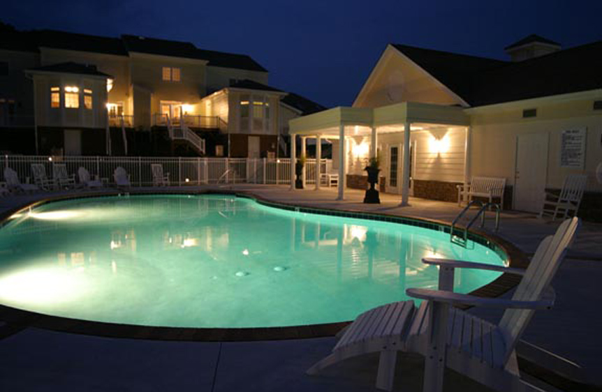 private swimming pool & clubhouse at night