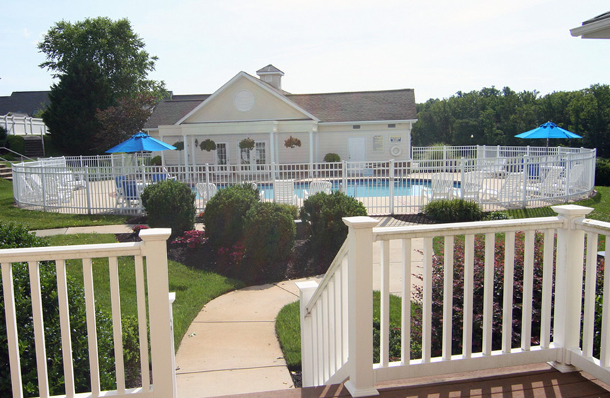 private swimming pool & clubhouse in daytime